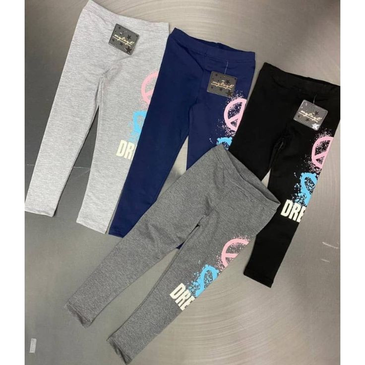 Legging enfant noir avec inscription "DR DRE" et détails colorés
