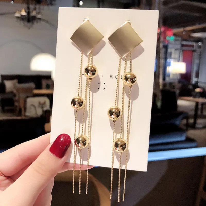 Boucle d'oreille en argent S925 avec aiguille longues et pomppon
